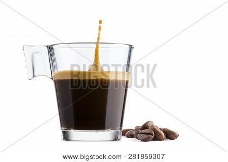 Black Coffee In Glass Cup With Coffee Beans And Jumping Drop On White Background