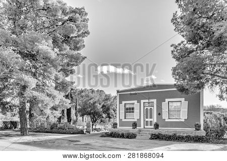 Loxton, South Africa, August 7, 2018: A Monochrome Street Scene, With An Historic House, In Loxton I