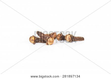 Group Of Five Whole Small Dried Cloves Spice Isolated On White Background