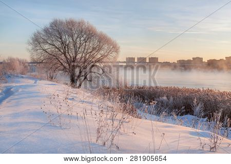 Winter Landscape In The Early Morning Overlooking The City Of Dubna And The Bridge Over The Volga. F