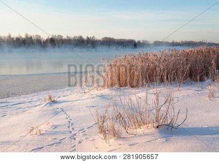 Winter Landscape In The Early Morning Overlooking The City Of Dubna And The Bridge Over The Volga. F