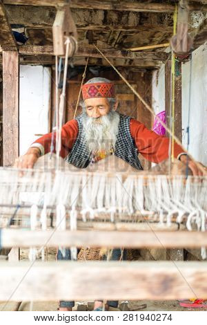 Kullu, Himachal Pradesh, India - August 09, 2018 : Himachali Pattu Saree Weaver On His Loom, Handloo