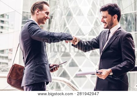 Success Of Fist Bump Business Partners.partnership Approval And Thanks Gesture Concept