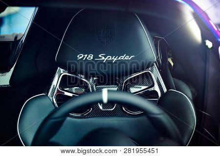 LONDON, UK - CIRCA JUNE 2014: Carbon fibre and leather seat of a Porsche 918 Spyder. Shot through the windscreen.