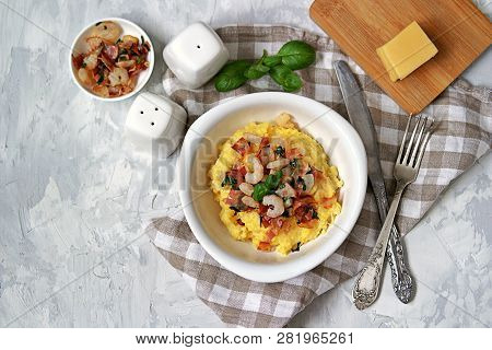 Homemade Shrimp And Grits With Bacon, Chedder Cheese And Parsley In A White Bowl. American Cuisine. 