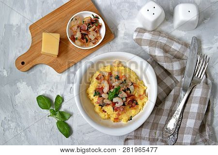 Homemade Shrimp And Grits With Bacon, Chedder Cheese And Parsley In A White Bowl. American Cuisine. 