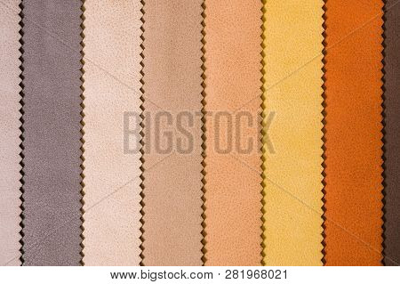 Colorful And Bright Fabric Samples Of Leatherette Furniture And Clothing Upholstery. Close-up Of A P