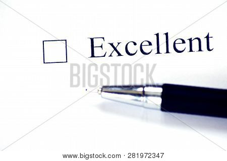 Checklist With A Word Exellent On White Paper With Pen. Checkbox Concept.