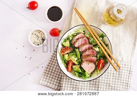 Tuna Salad. Japanese Traditional Salad With Pieces Of Medium-rare Grilled Ahi Tuna And Sesame With F