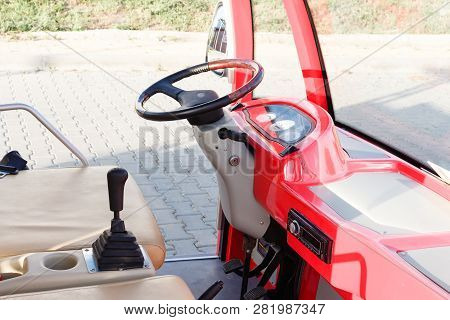 Empty Cab And Old Model Steering Wheel Of Red Colored Open Touristic Minibus In Byala, Bulgaria.