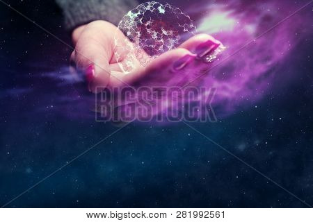Human Hand Holding With Cell Dividing. Nebula Dust. Mixed Media.