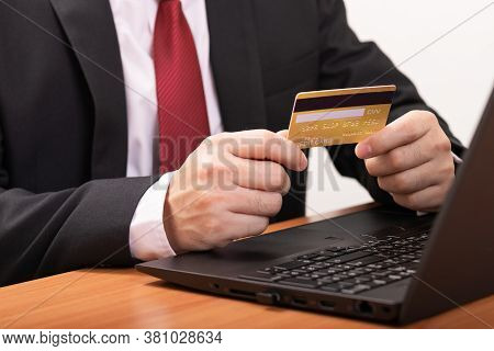 Hand Putting Coins On Stack On Table,saving Money Concept Or Business Growth Concept
