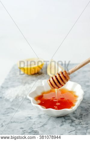 Facial Treatment Preparation. Simple Homemade Facial Mask And Spa Products, Honey, Lemon On Marble P