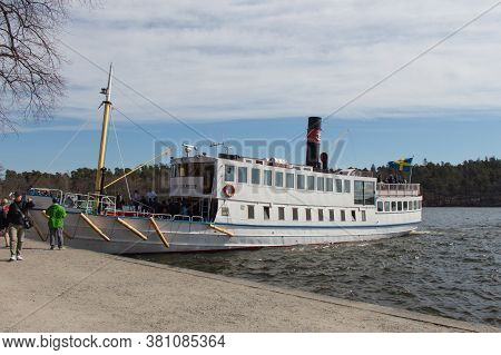 Drottningholm, Sweden - April 21 2019: The View Of Ferry Boat On April 21 2019 In Drottningholm Swed