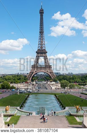 The Eiffel Tower, Paris, France, And The Fontaine Du Jardins Du Trocadero
