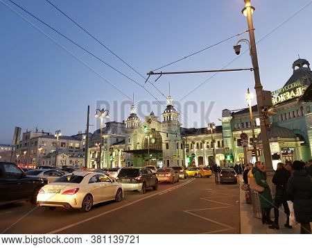 Russia, Moscow 03,04,2019 Belorussky Station In The Evening And The Traffic Of Cars In Front Of Him