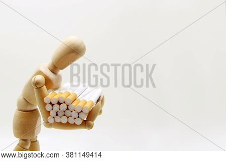 Illustration Of A Mannequin Heavily Carrying An Armful Of Cigarettes.on White Background. World No T