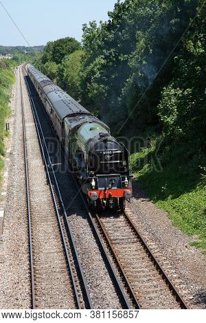 Steam Locomotive 60163 Tornado On A Mainline Excursion Train Near Wareham In England, Uk