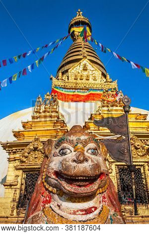 Stone Buddhist Lion Guard Statue At The Swayambhunath Or Swayambhu Or Monkey Temple Is An Ancient Re