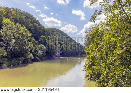 Russia Town Resort. People Sail On Catamarans On A Mountain River On A Sunny Summer Day. Water Attra