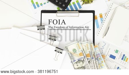 Paper With The Freedom Of Information Act Foia On A Table