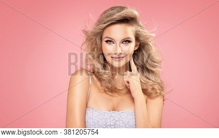 Blond Girl With Glamour Makeup.