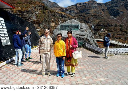 Nathu La, Sikkim, India, 19  October,  2018:   An Indian Tourist Family Of Father, Mother And Son Po