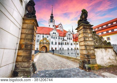 Astonishing Autumn View Of Hartenfels Castle On Banks Of The Elbe. Picturesque View Of Torgau Town. 