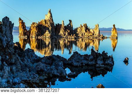 Picturesque Mono lake. California. Evening sunset. The columns - remains of 