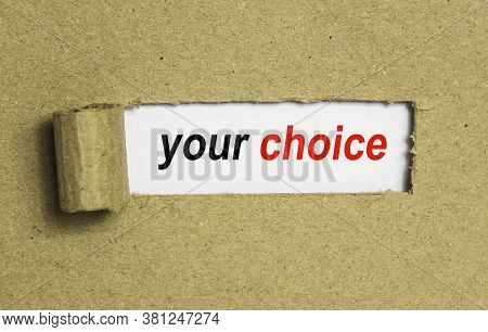 The Text Your Choice Behind Torn Brown Paper