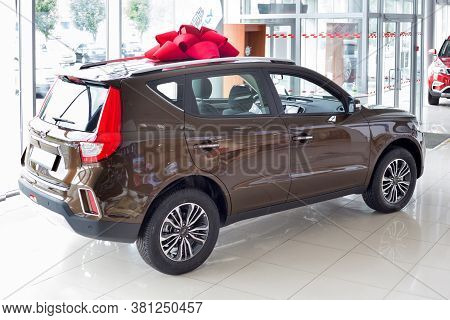Russia, Izhevsk - August 14, 2020: New Modern Emgrand X7 In The Geely Showroom. Back And Side View.