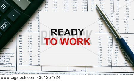 Work Smarter Text Ready To Work On White Sheet With Pen, Calculator And Tables