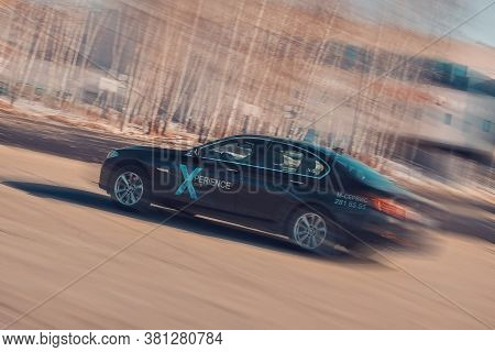 Bmw Advertising, Moscow, 1.11.2018: Demonstration Of A Model Of A Black Car, Cars On A Test Track, D