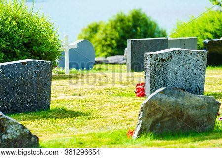 Norwegian Churchyard In Nes Village At Fjord Lusterfjord, Vestland County, Norway.