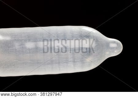 One Quality White Latex Condom, The Condom Is Not In The Package, Made Of Natural Latex For The Prev