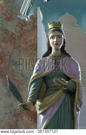 BRDOVEC CROATIA - SEPTEMBER 17, 2012: St. Lucia statue on the altar of St. Barbara in the Church of St. Vitus in Brdovec, Croatia