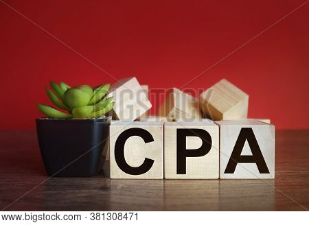 Conceptual Image Of Business Acronym Cpa As Cheapest Price Available Written On Wooden Blocks. Updat
