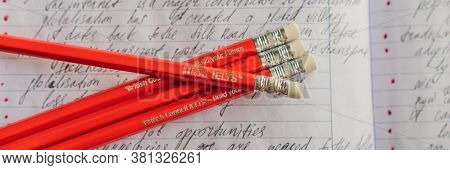 Vietnam, Nha Trang, 14.07.2020: Ielts Red Pencils And Essay Notebook For The English Exam Banner, Lo