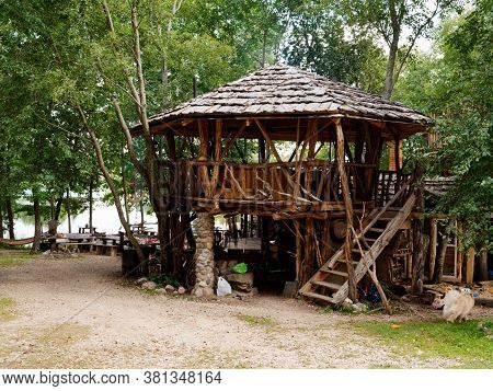 Glubokoe, Belarus - August 5, 2020: Agriturismo Zapavedny Island In The Forest On The Shore Of The L