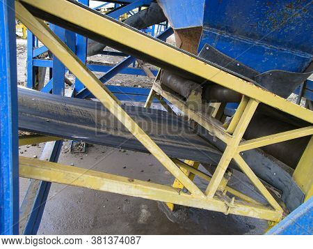 Bottom, Receiving Part Of The Belt Conveyor. Dispensing Hopper, Support And Shaping Rollers And Safe