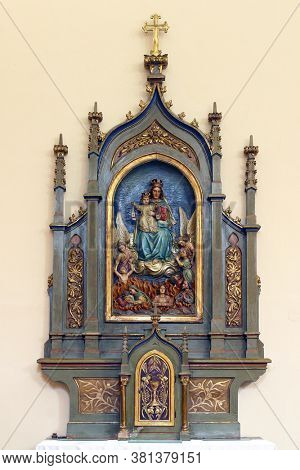 KANISKA IVA, CROATIA - OCTOBER 01, 2011: Altar of Our Lady of Mount Carmel in the parish church of St. George and the Immaculate Heart of Mary in Kaniska Iva, Croatia