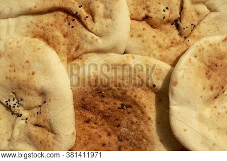 Background Made Of Multigrain Pita Bread. Famous Traditional Arabic Flat Bread. Egyptian Bread.