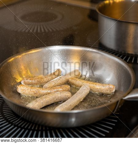 Cooking White German Sausages Close Up View