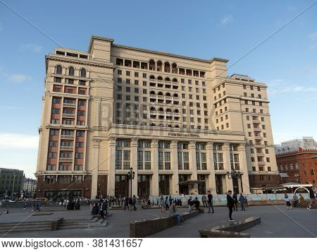 Moscow - May 21: Four Seasons Hotel Moscow Building And Walking People On May 21, 2019 On Manezh Squ