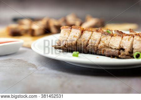 Oriental Roast Pork Belly Or Char Siew On White Plate