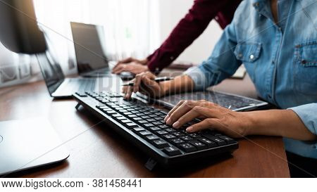 Team Of Programmer Working To Find Solution To Problem And Coding Technologies In A Software Develop