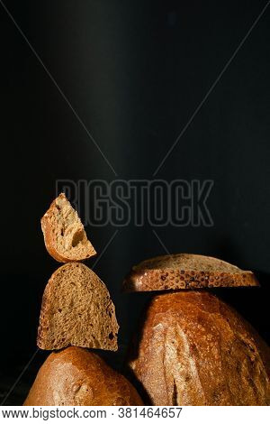 Slices Of Fresh Rye And Wheat Bread Slices. Organic Baking On Healthy Rural Products.