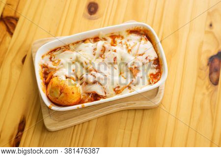 Cheese Tokboki (korean Hot And Spicy Rice Cake) With Boiled Egg.