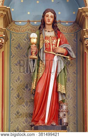 PESCENICA, CROATIA - SEPTEMBER 07, 2013: St. Barbara, statue on the altar of St. Barbara in the parish church of the Assumption of the Virgin Mary in Pescenica, Croatia