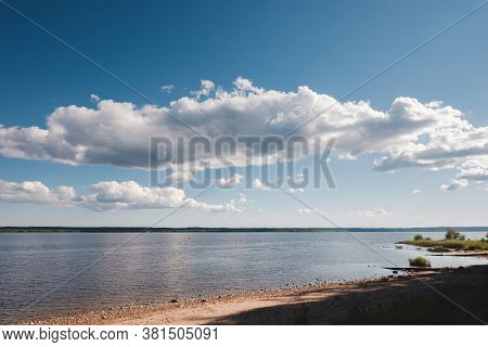 Vuoksa River Near Imatra In The Leningrad Region, Russia. Coastline With Pine Forest Reflected In Vu